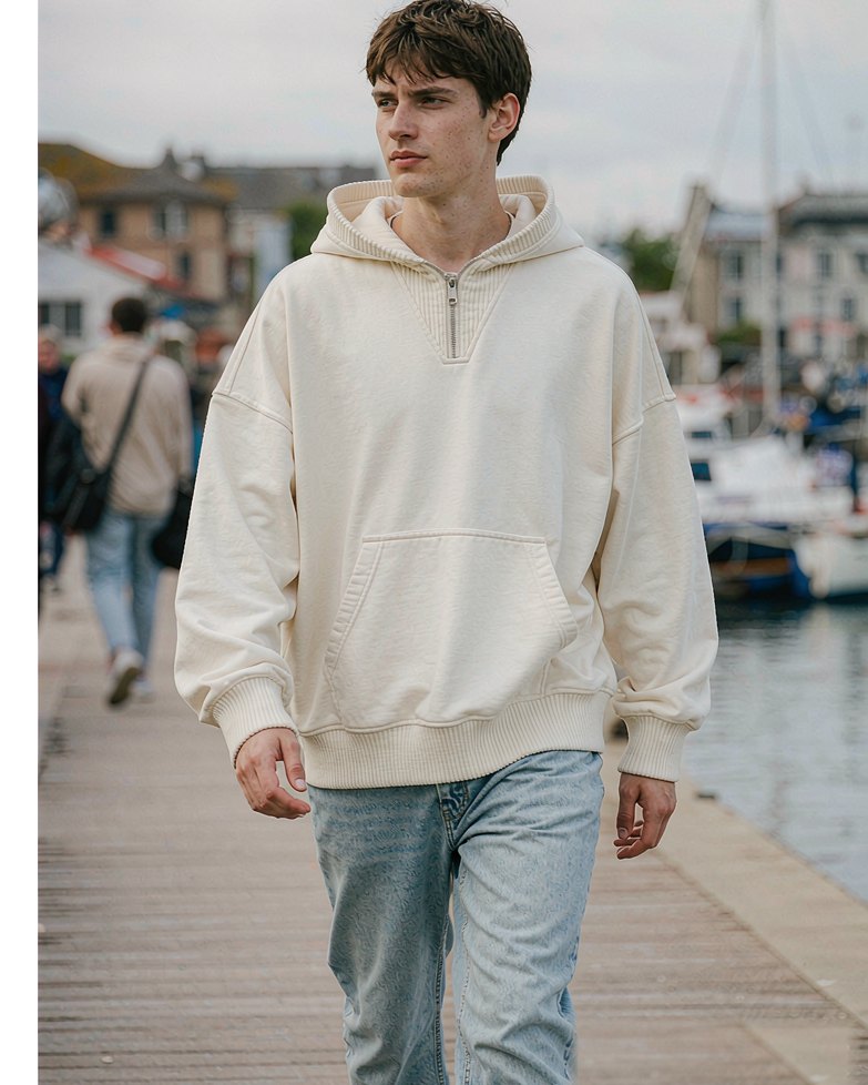 Heavy Hoodie in Ecru worn by a model
