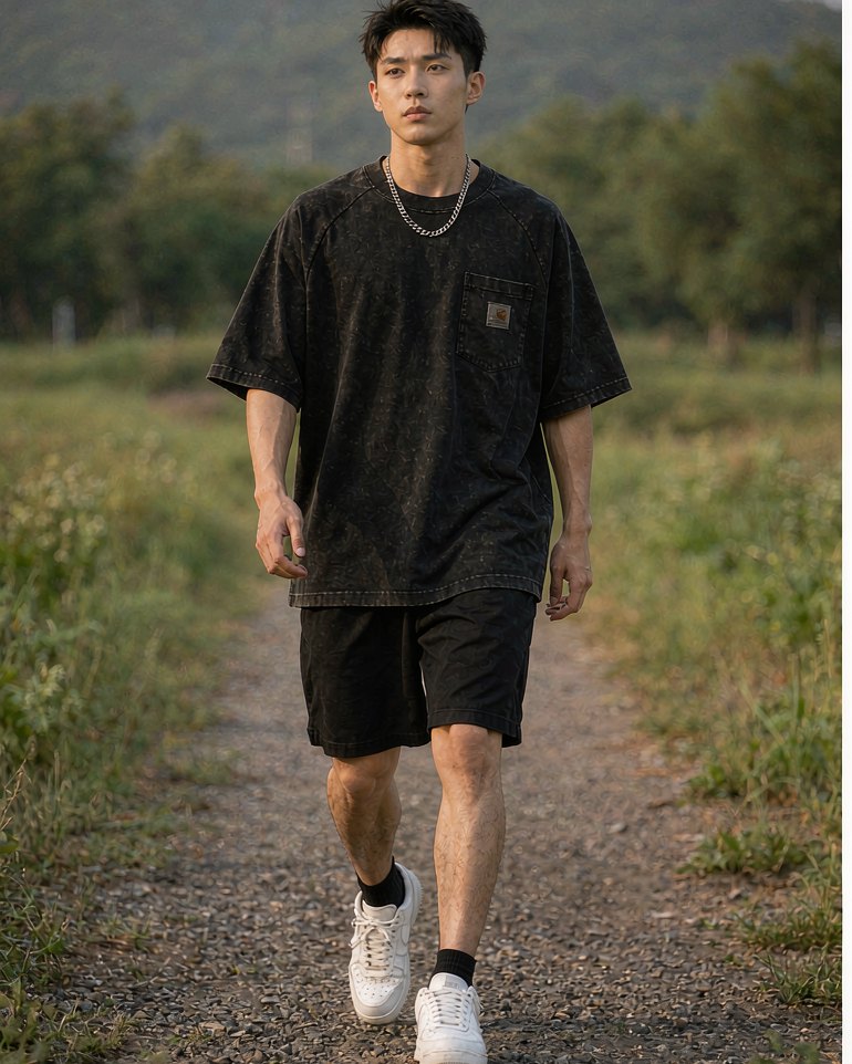 Heavy T-Shirt in Washed Black worn by a model