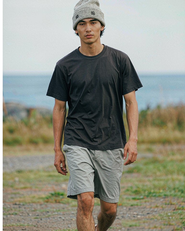 Logo Beanie in Heather Grey worn by a model