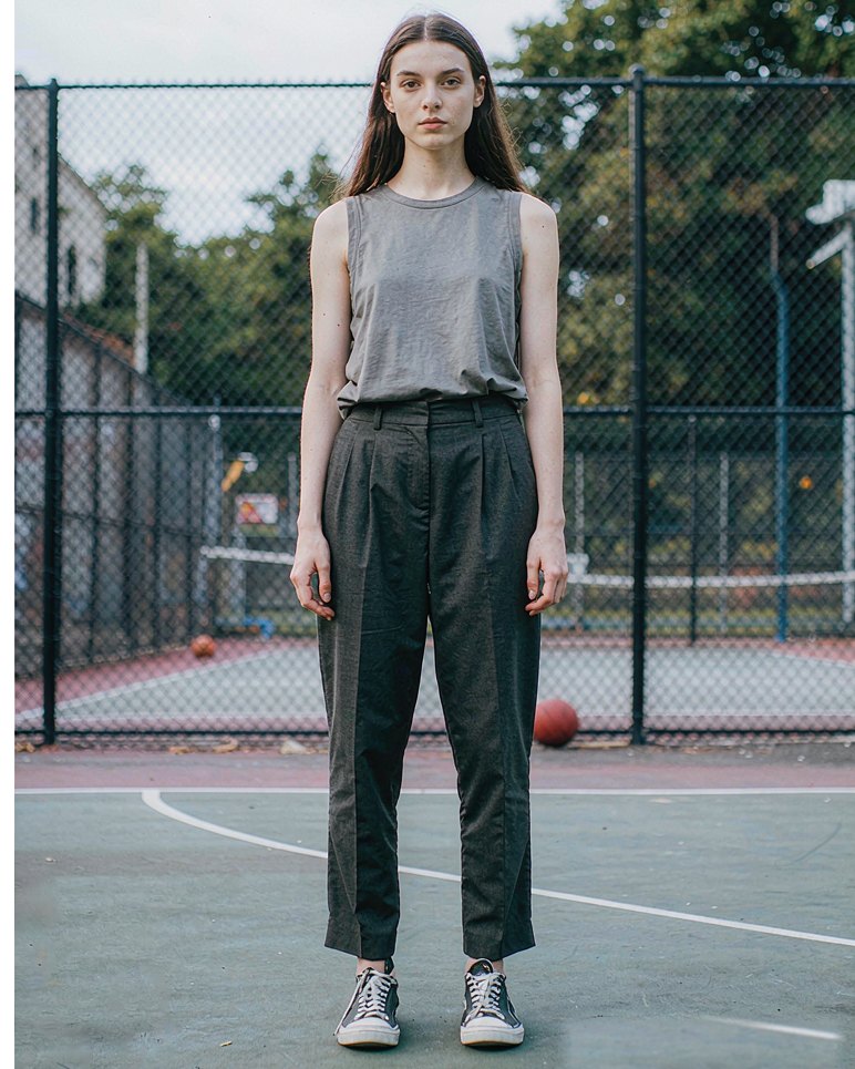 Pleated Trouser in Charcoal worn by a model