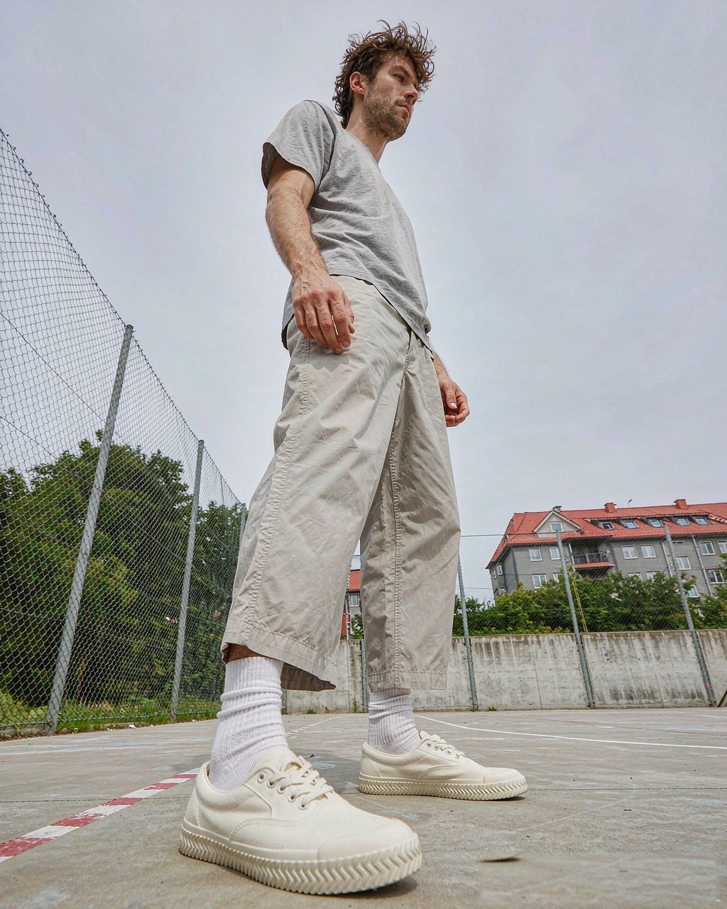 Slip-On Sneaker in Ecru Canvas worn by a model