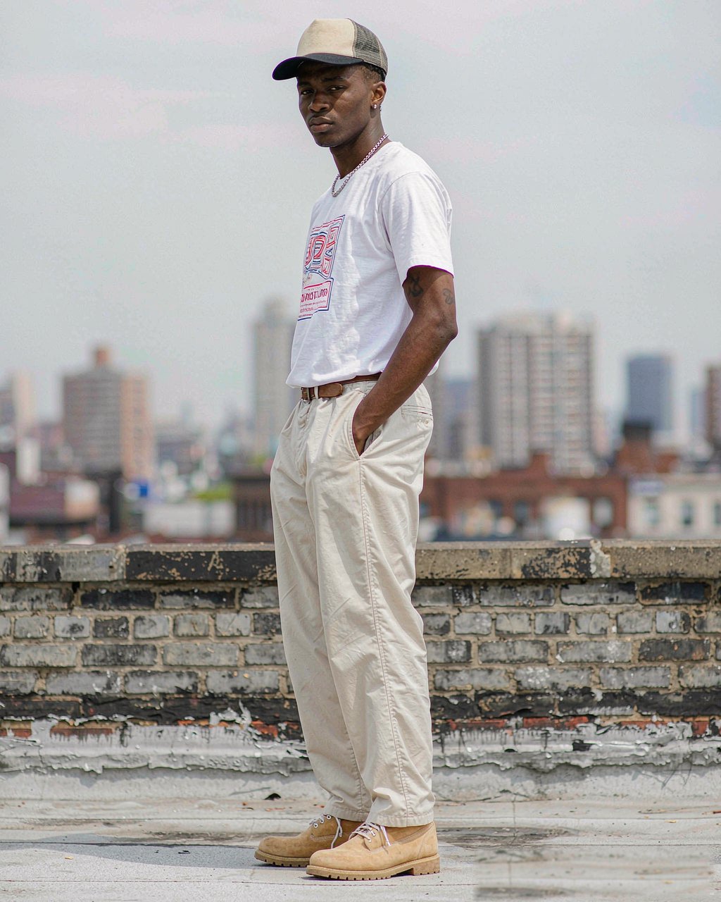 Trucker Cap in Stone Mesh worn by a model